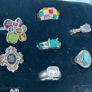 Eight Silver tone and gold tone Rings Set